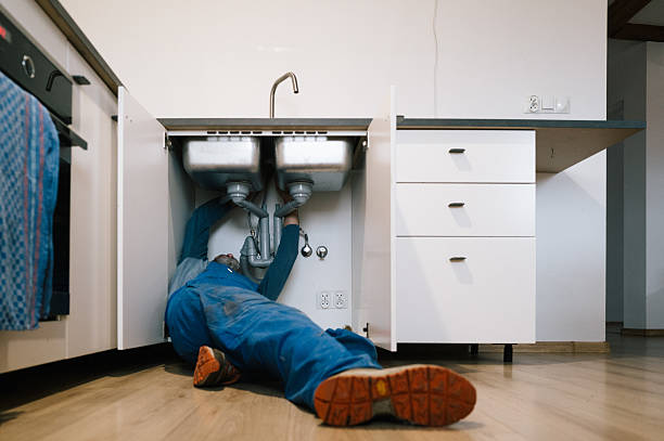 Professional Drain Cleaning technician working in Elkins, NH